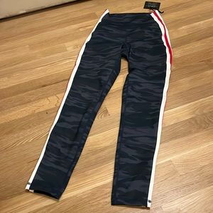 High wasted workout leggings in a blue cameo print with red/white stripe